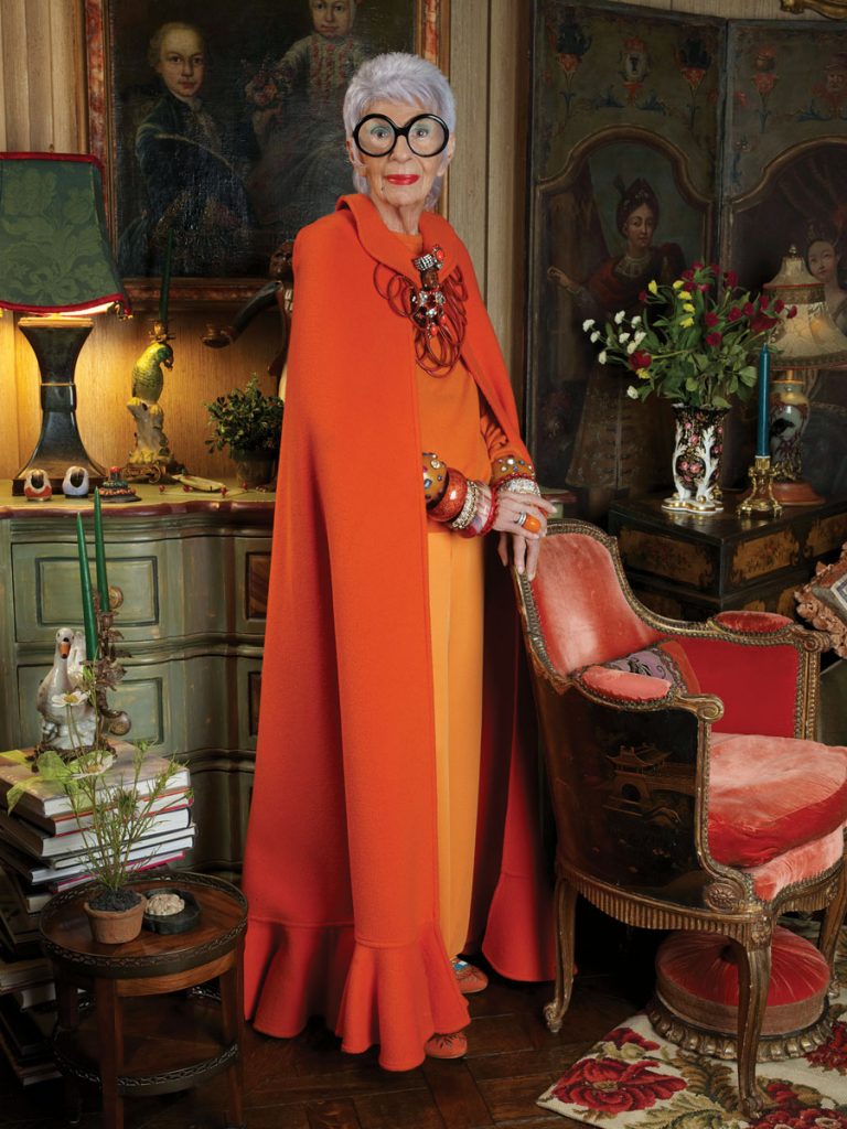 A photograph of Iris Apfel by Keith Major from Iris Apfel: Accidental Icon. From Iris Apfel: Accidental Icon by Iris Apfel; photograph of Iris Apfel by Keith Major. Published by Harper Design, an imprint of HarperCollins Publishers; © 2018 by Iris Apfel. 