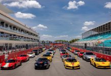 A huge line-up of modern-day Ferrari road cars ready for a demonstration lap. Photo courtesy of Ferrari