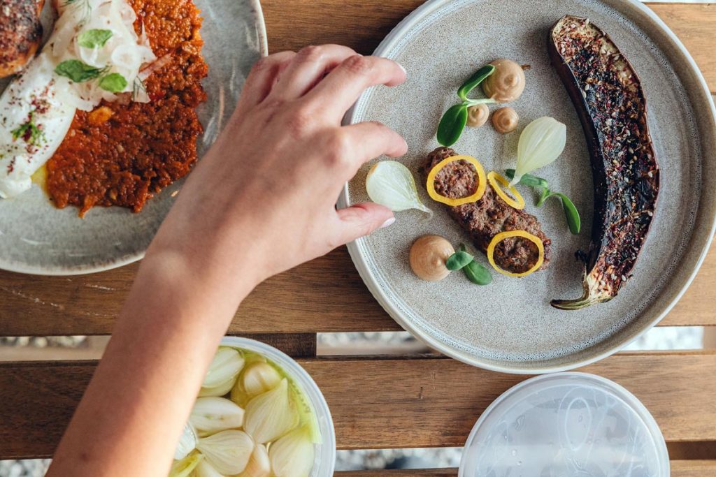 A5 Wagyu kofta with black garlic emulsion, zaatar roasted eggplant, and saffron pickles. Photo by Keiko Lynn_@keikolynn