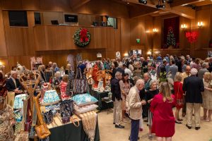 Guests shopping the Christmas Boutique. Photo courtesy of the Garden Club of Palm Beach