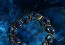 The Scarab necklace was designed in the early 1900s and boasts iridescent glass beetles set in gold. Photo courtesy of Tiffany & Co.