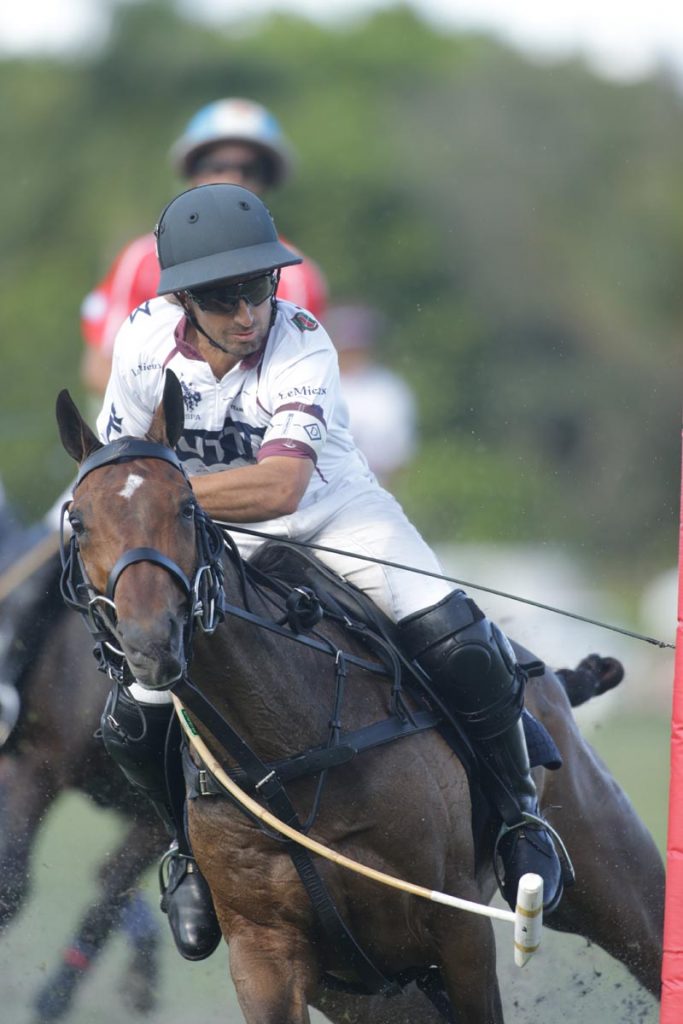 Facundo Llosa of Dutta Corp makes a neck shot. Photo by David Lominska