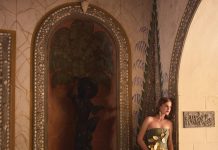 Vintage-Meets-Modern in Spring Looks Oscar de la Renta gown; Carolina Herrera earrings; Jimmy Choo handbag. Photo by Gabor Jurina