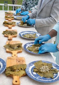 Attendees rolled their own dolmathes. Photo by Jerry Rabinowitz