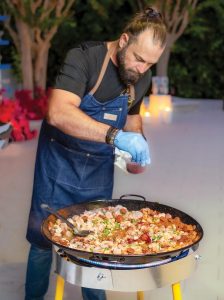 Chef Lazaros Chasomeris cooked seafood paella and spinach pie, among other Greek delicacies. Photo by Jerry Rabinowitz