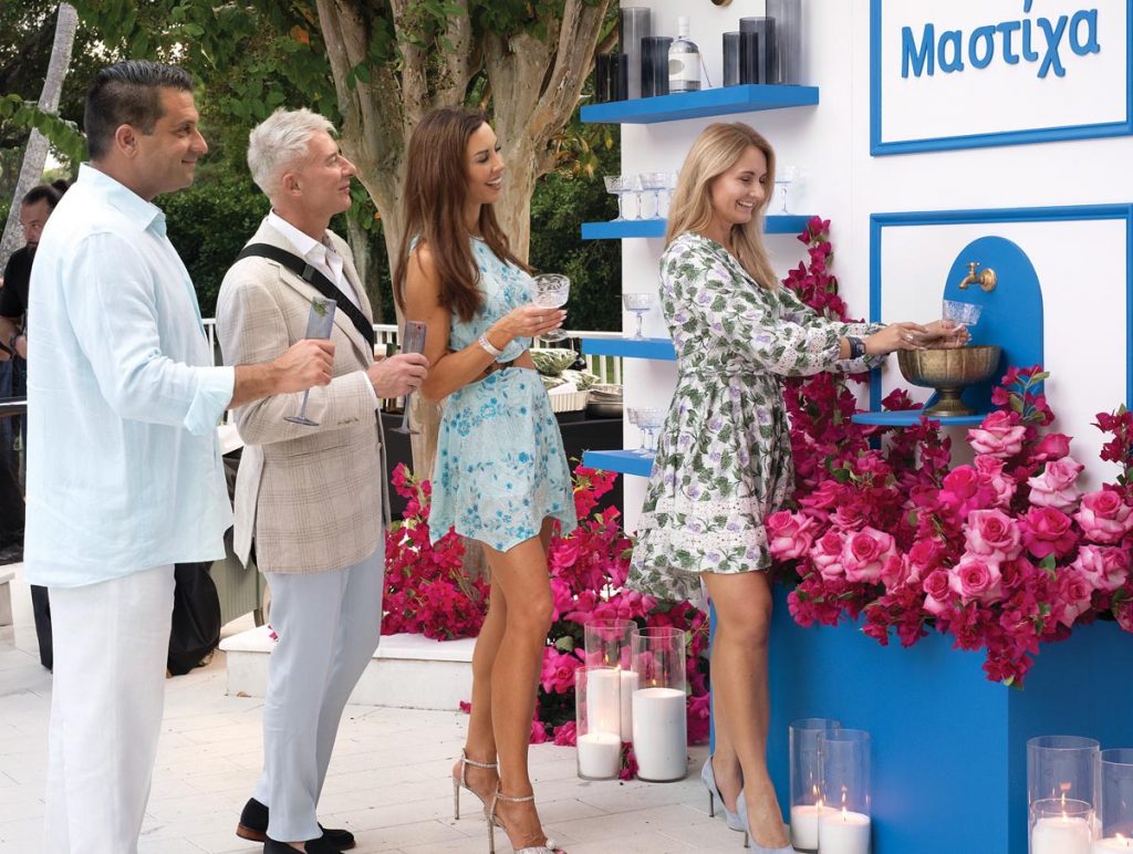 Guests filled their glasses at a mastika fountain. Photo by Jerry Rabinowitz